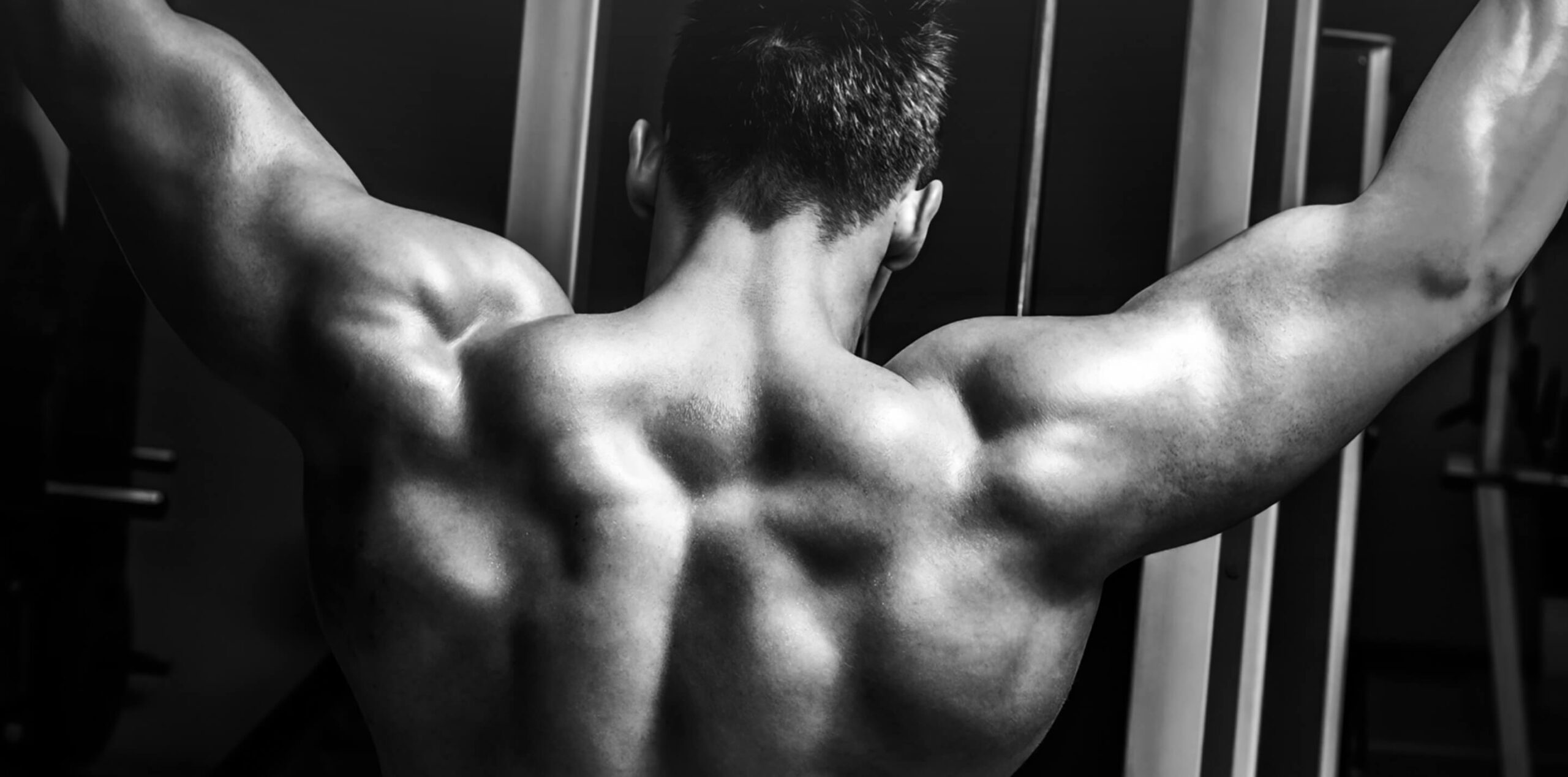 strong-man-pulling-a-vertical-upper-block-2023-11-27-05-05-10-utc (1)